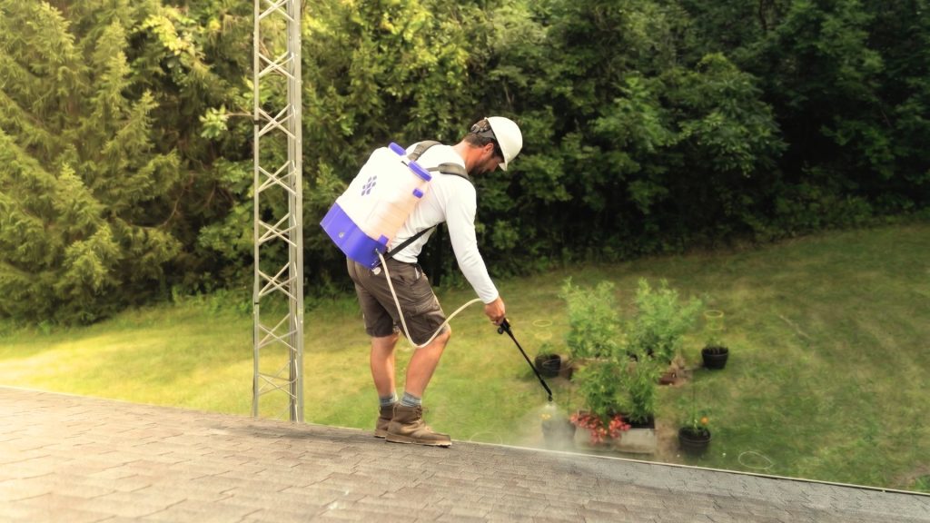 Certified GoNano Contractor installing NuRoof Revive on a residential asphalt shingle roof